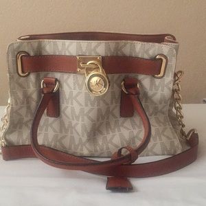 White and brown michael kors purse